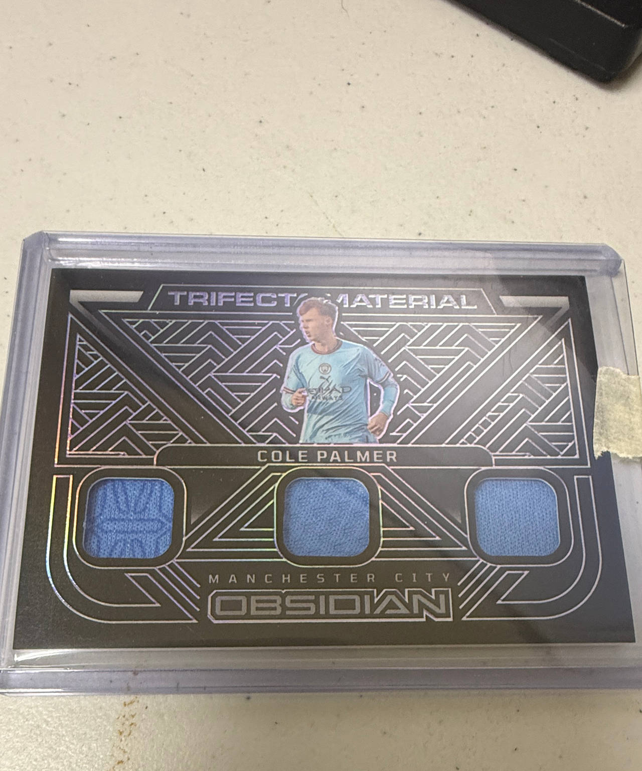 2022-23 Panini Obsidian Cole Palmer Trifecta Material Triple Relic