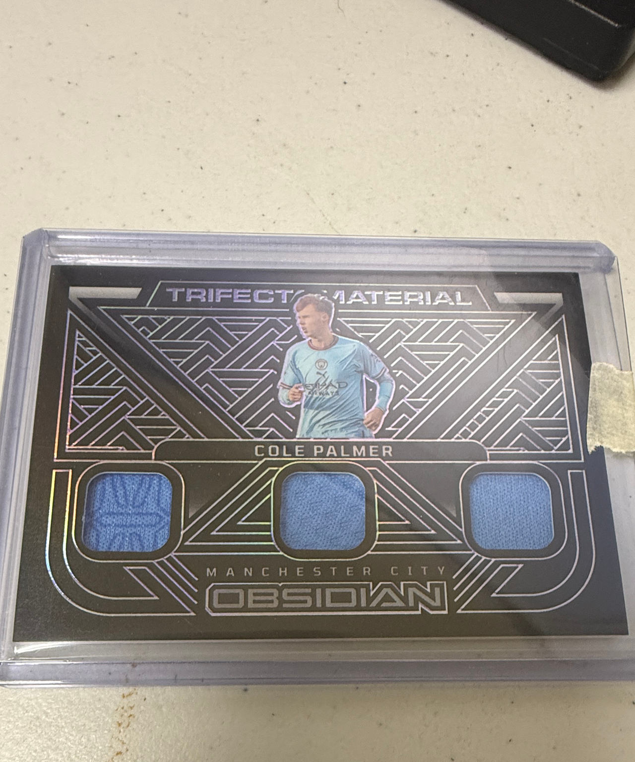 2022-23 Panini Obsidian Cole Palmer Trifecta Material Triple Relic