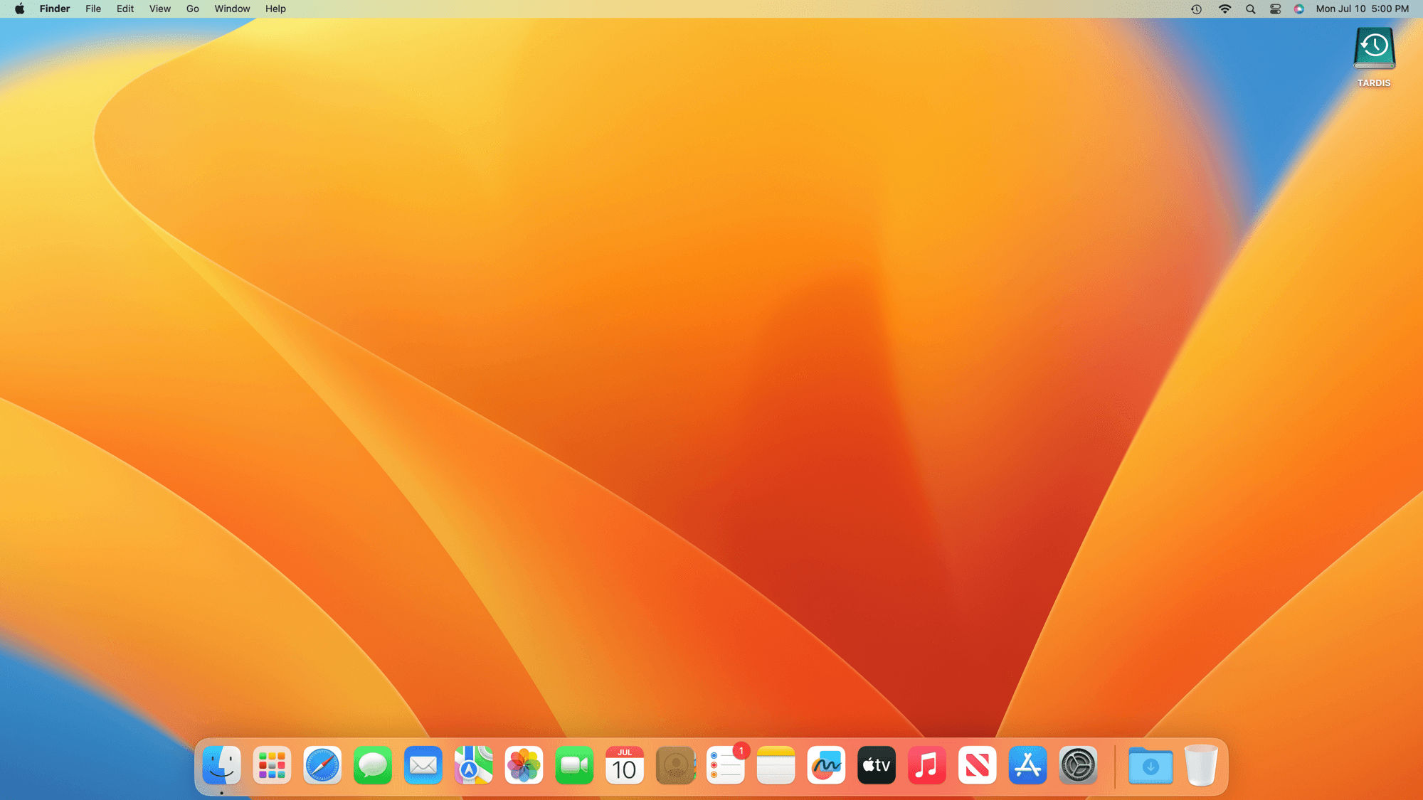 A fresh, default macOS Ventura desktop with a Time Machine drive named “TARDIS” in the corner.