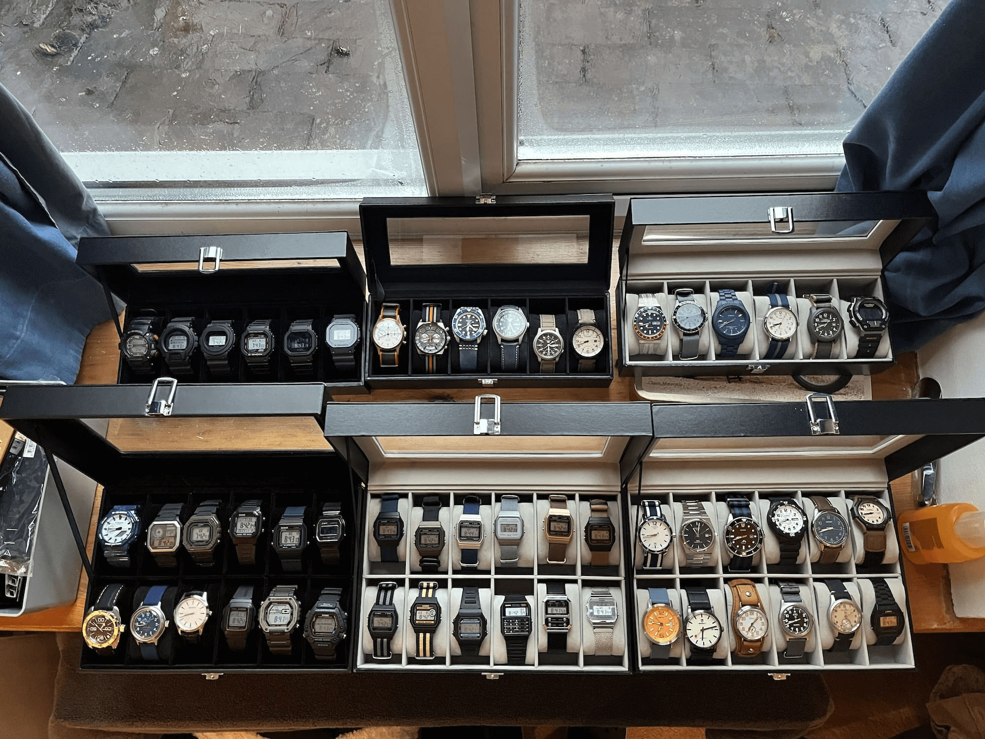 Kev’s six cases of traditional wristwatches.