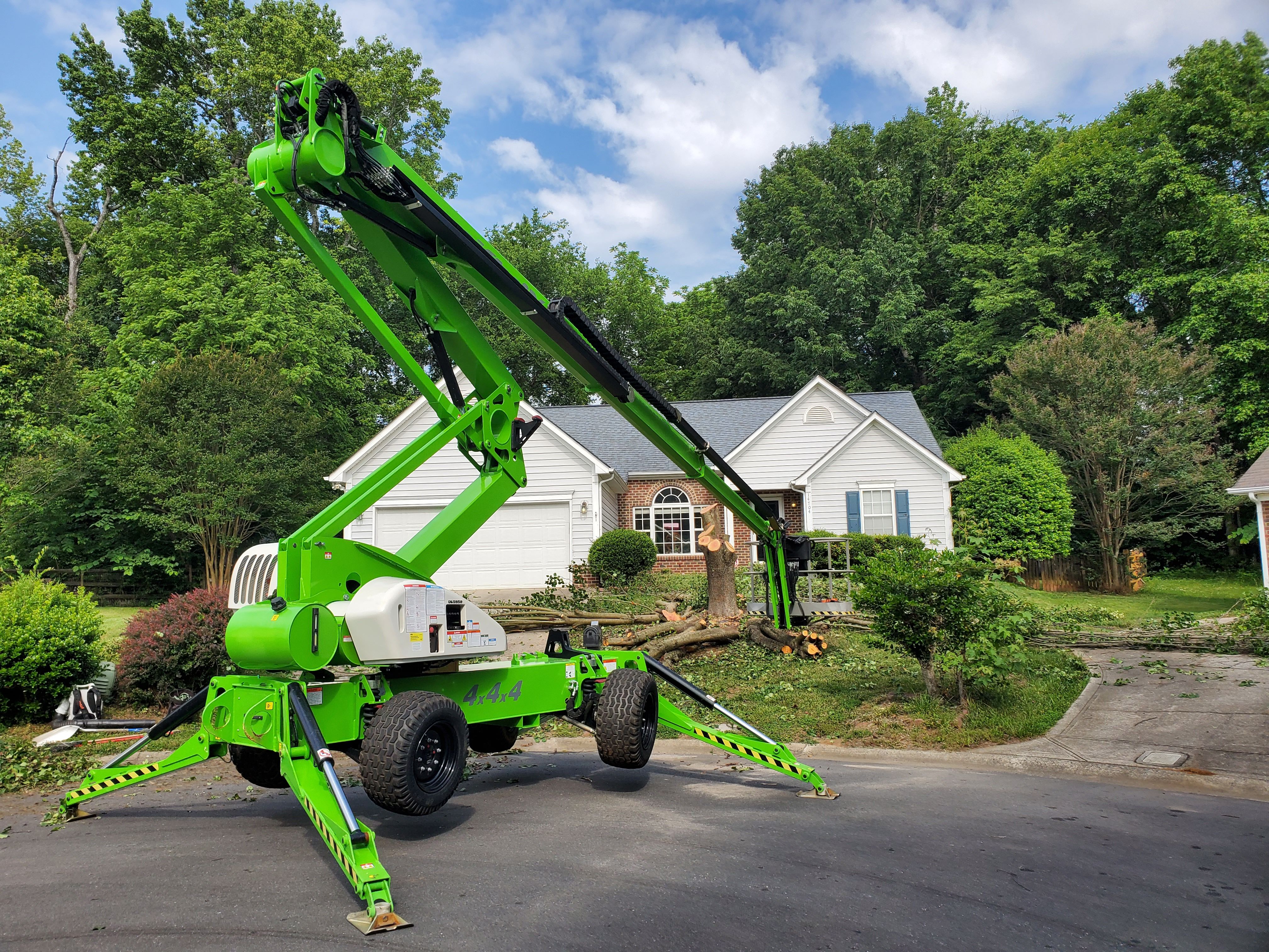 Lift parked in front of a house.