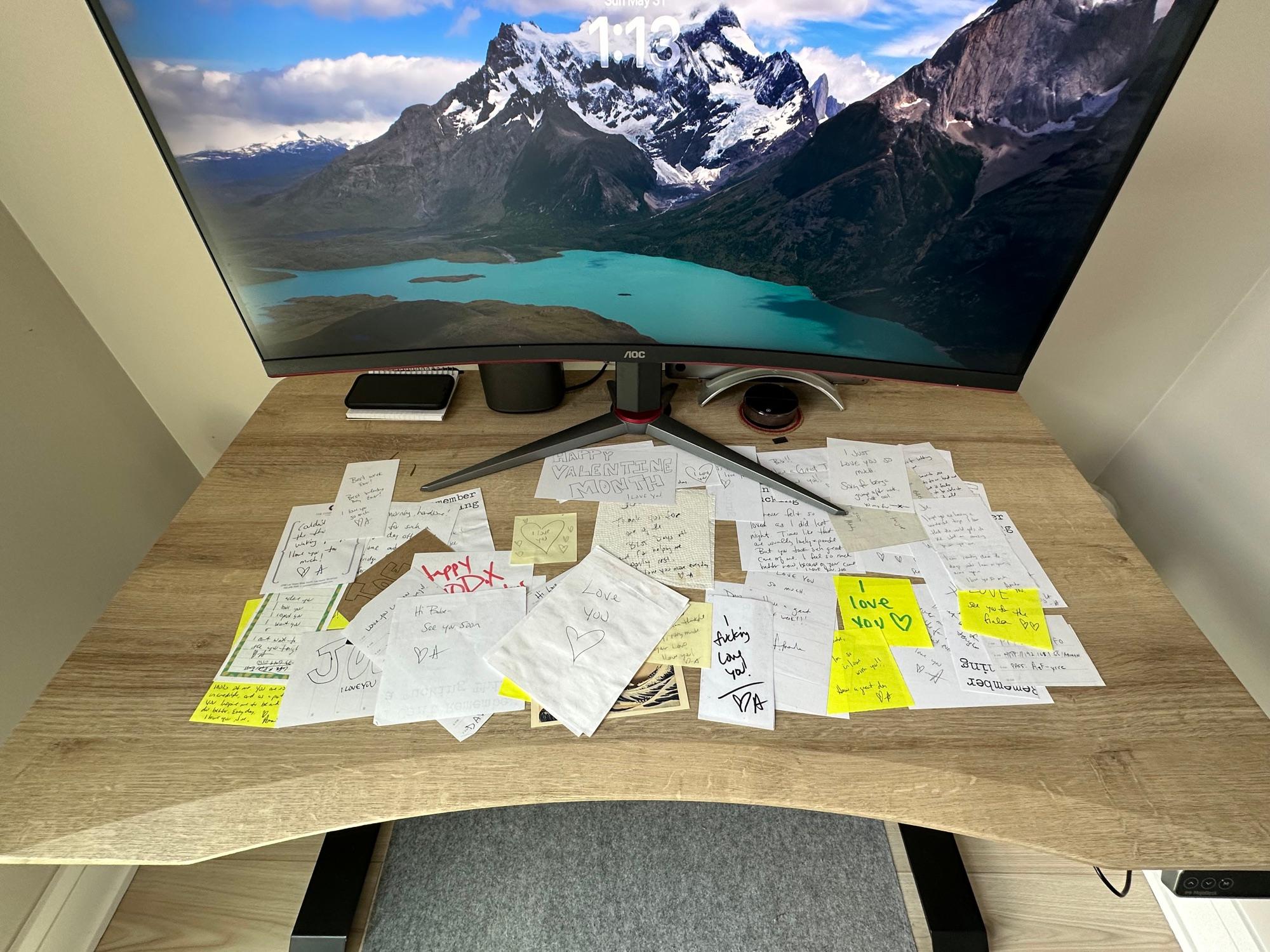 Joe's desk covered with handwritten notes from his partner