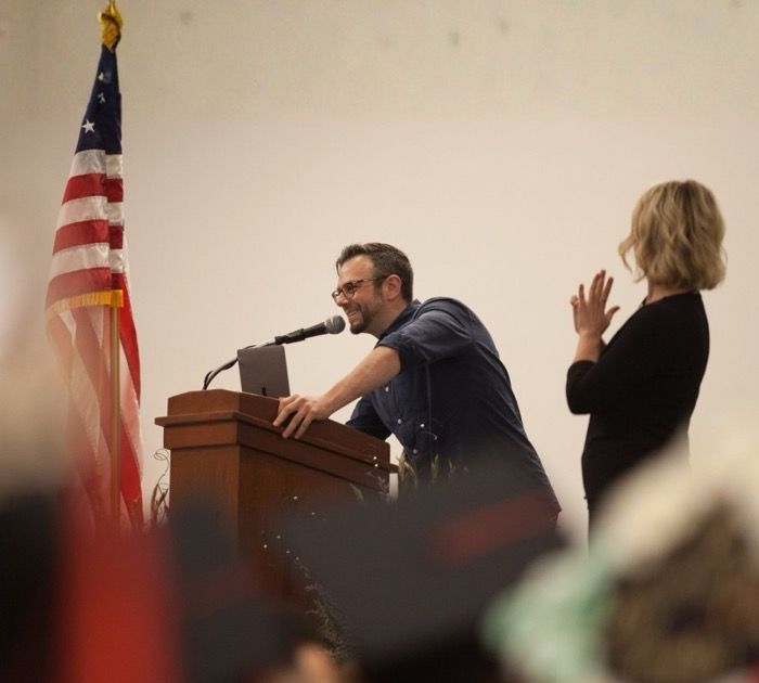 Graduating college, then coming back to give the commencement address.