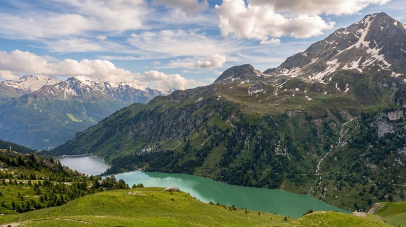 Afternoon light over the breathtaking view from the balcony of Refuge La Fournache on the third day of the Tour des Glaciers de la Vanoise trek.