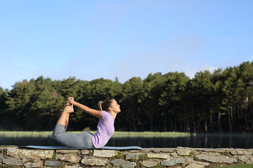 Bow pose in hindi