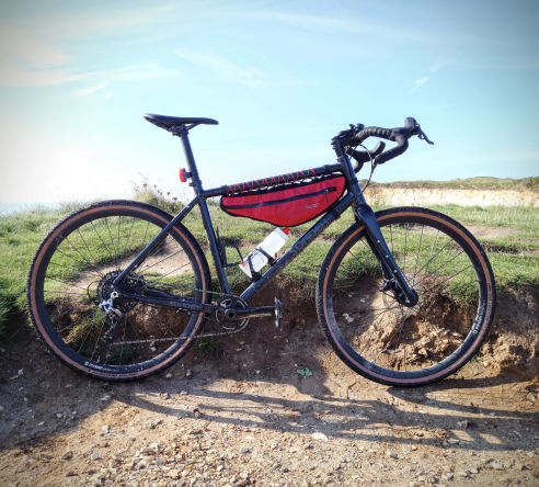 Rider riding gravel bike on Isle of Purbeck trails