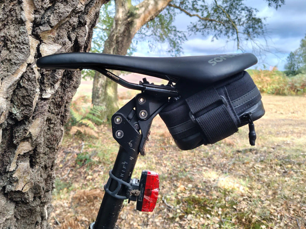 Redshift Quickdraw saddle bag mounted cleanly under a gravel bike saddle on a Redshift ShockStop suspension seatpost