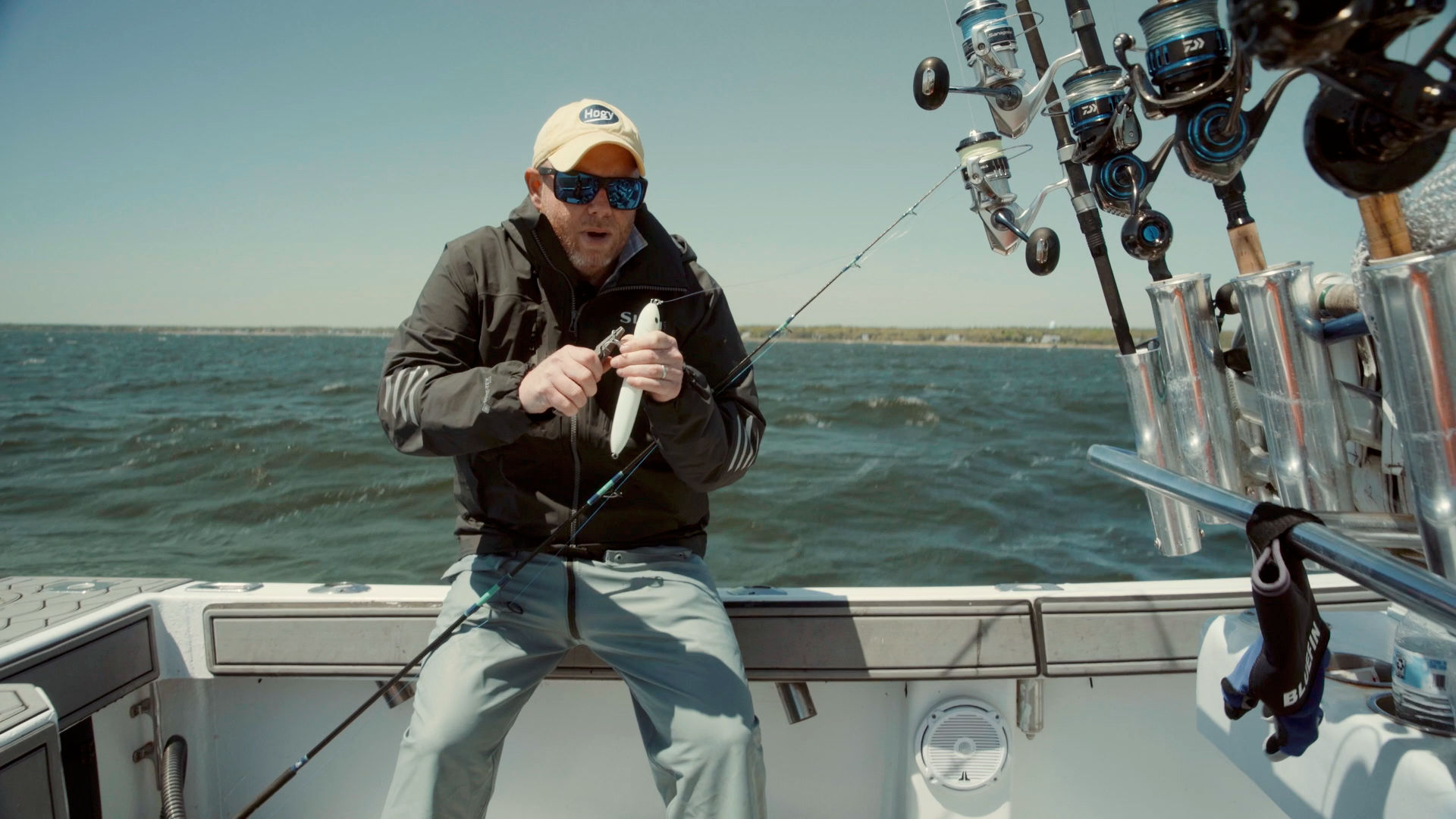 Mashing barbs on treble hook with pliers