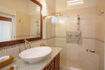 curtain-bluff-deluxe-beachfront-room-lower-level-bathroom