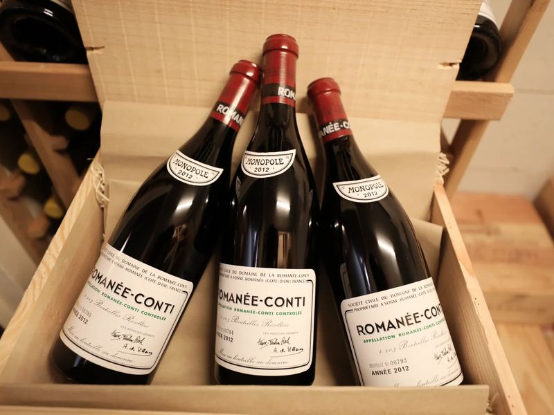 一箱 DRC 的原裝木箱（OWC）近景，強調其對回收價值的影響