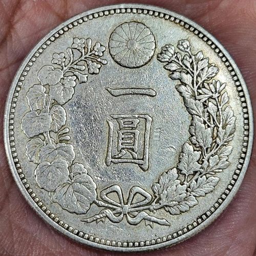 一枚鑄打精良、龍鱗清晰的日本明治龍銀