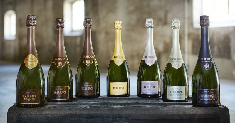 葡萄酒液位 (Ullage) 示意圖，展示從瓶頸 (BN) 到瓶肩中部 (MS) 的不同液位