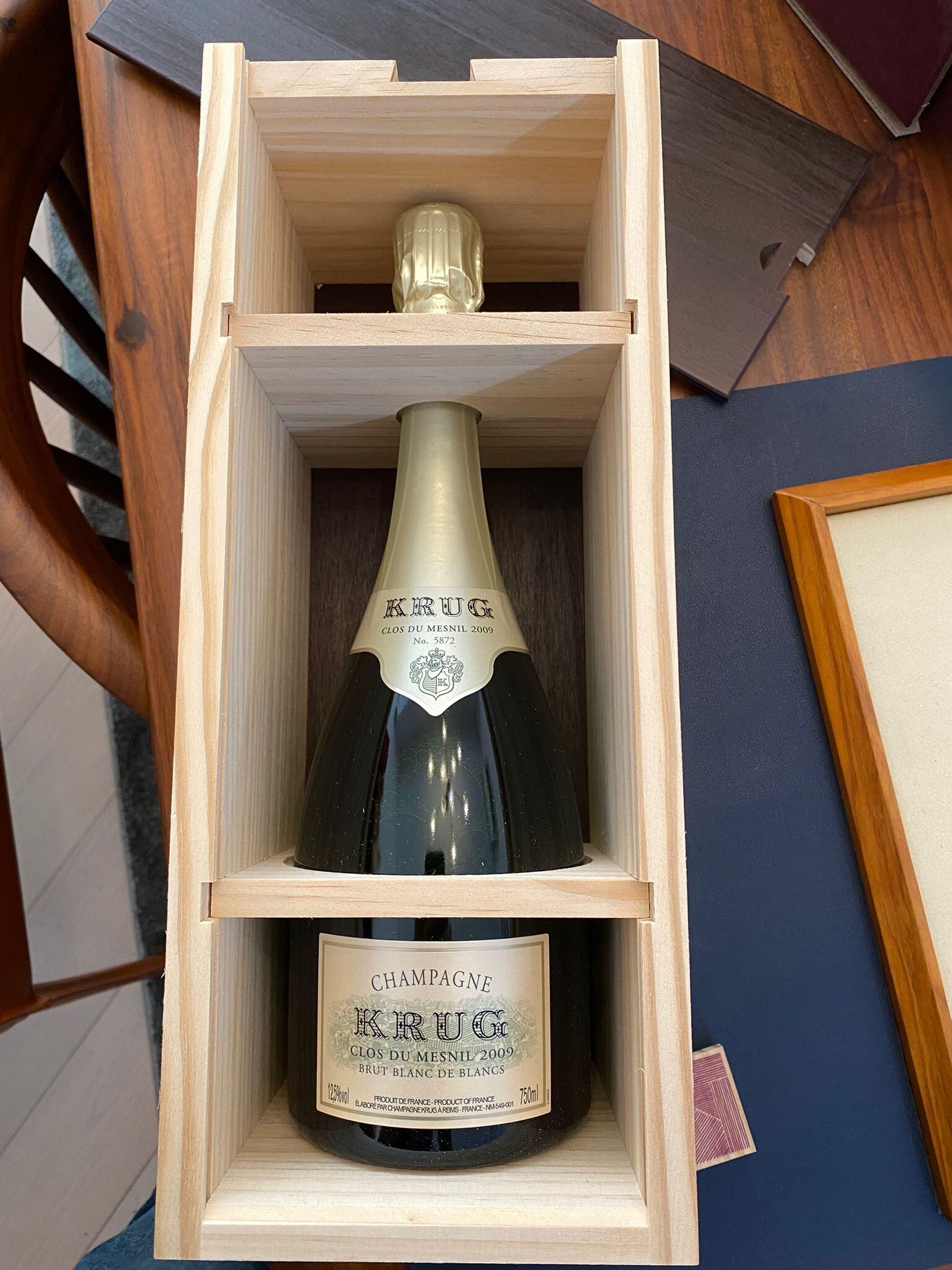 Krug 香檳瓶口封膜、酒標、滲漏痕跡與外盒品相細節