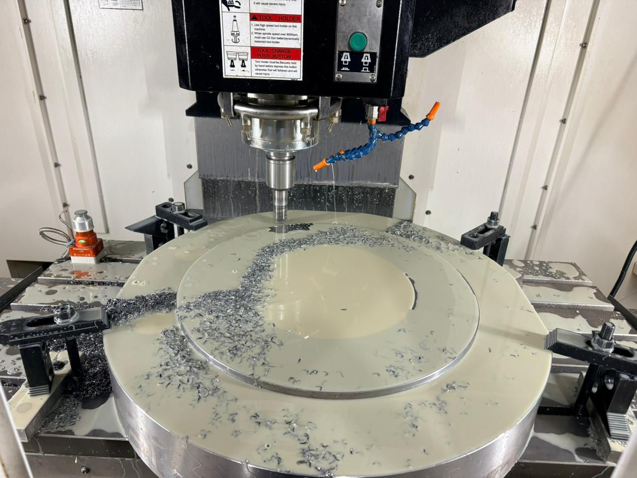 CNC vertical machining centre cutting an aluminium plate at RM CNC Solutions