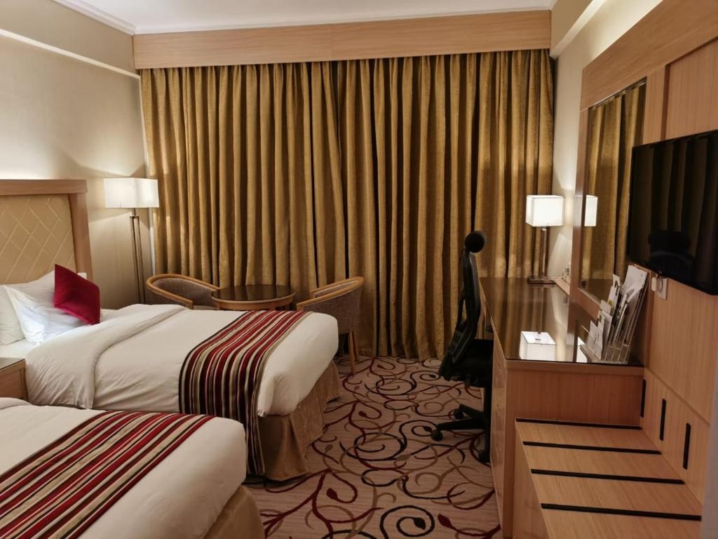 Twin Room with Pool View at Al Rabea Hotel - Photo 2