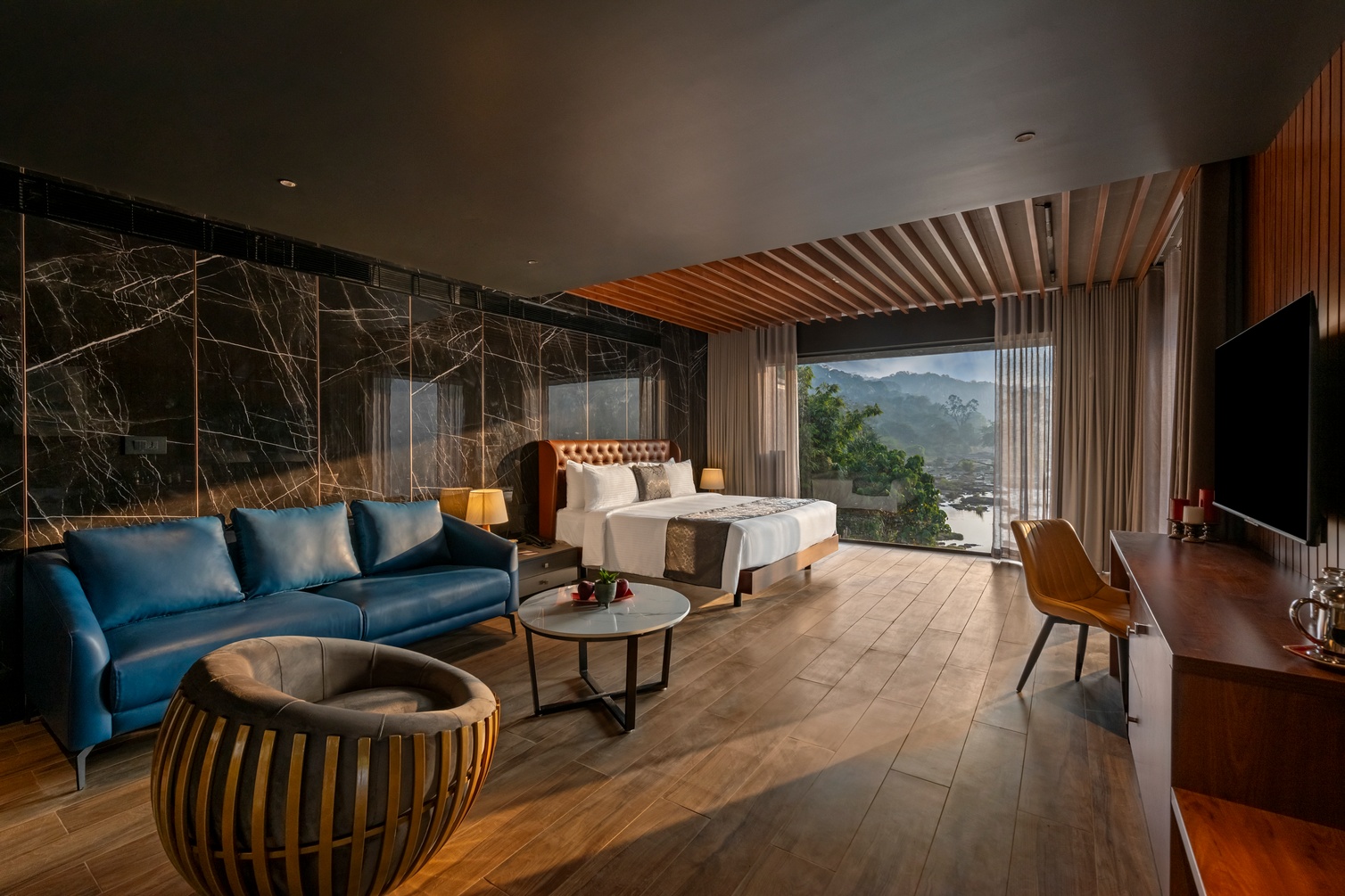 River Front Indulge Suite With Balcony at Sterling Athirappilly - Photo 1
