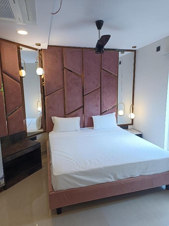 Premium King at Astra Hotels & Suites by Clover hospitality - Photo 1