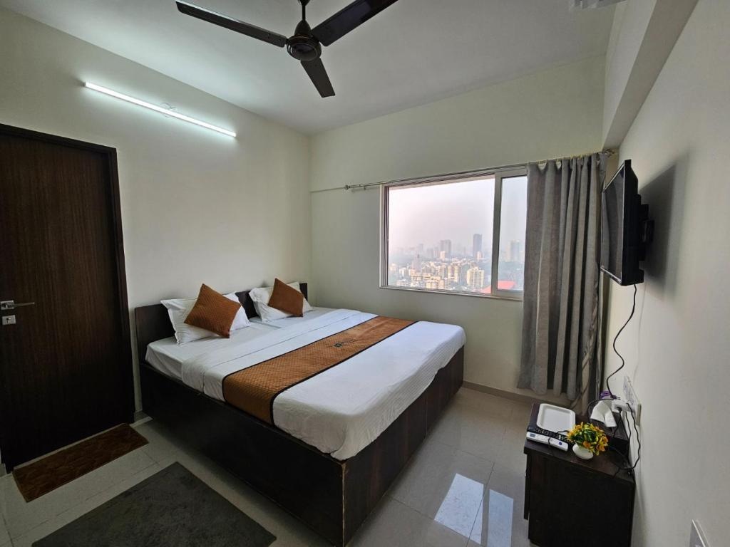 2 BHK - Family Room at Pinaki Comfort Stay- Malad - Photo 2
