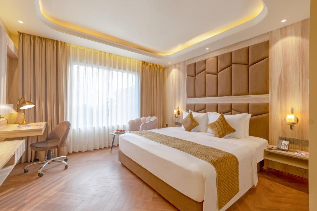 Deluxe Room at Sterling Saryu Ayodhya - Photo 1