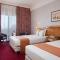Twin Room with Mountain View at Al Rabea Hotel - Photo 1