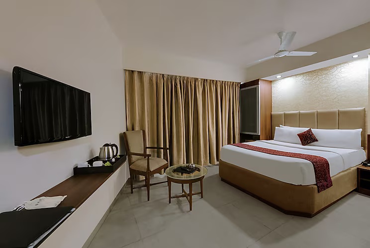 Deluxe Room at Central Beacon Hotel, Surat - Photo 1
