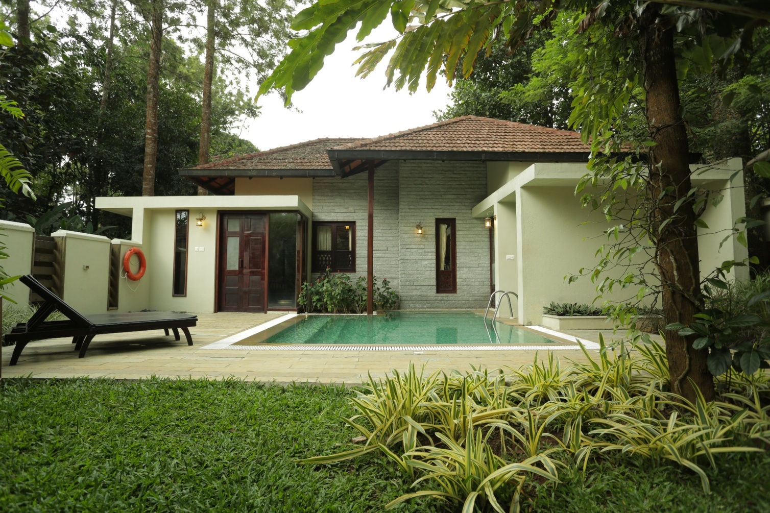 Premium Pool Suite at Greenwoods Resort Thekkady - Kondody Hotels - Photo 1