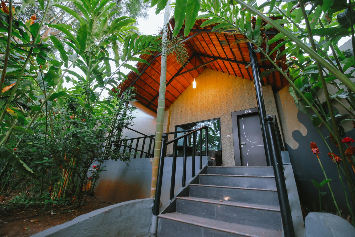 Honeymoon Cottage with Balcony and Bathtub at Coorg Jungle Camp Backwater Resort - Photo 1