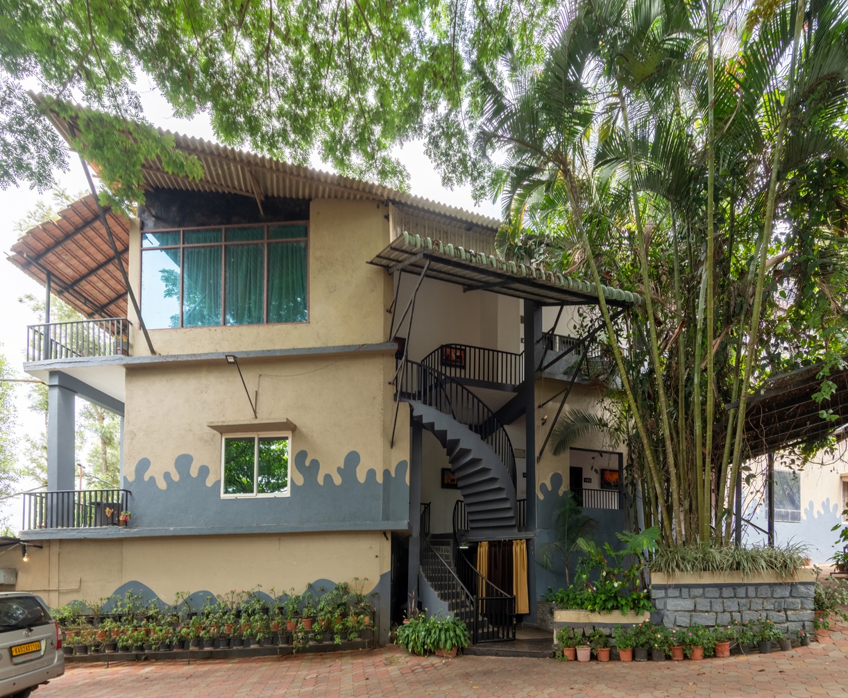 Deluxe Room AC with Balcony at Coorg Jungle Camp Backwater Resort - Photo 1