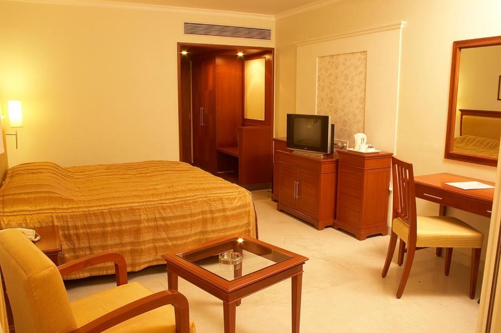 Family Room at Club Mahindra Golden Landmark Hotel - Mysuru, Karnataka - Photo 1