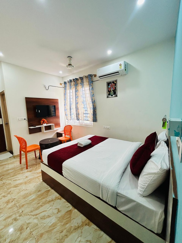 Deluxe Room at S K Comforts Rooms - Photo 1