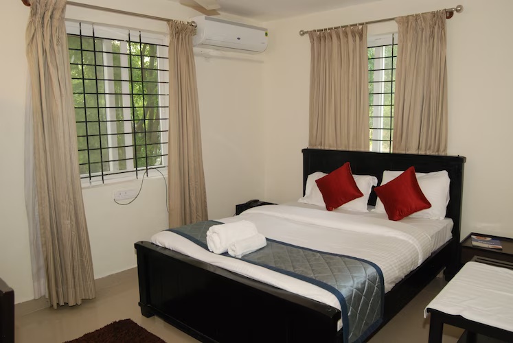 Deluxe Queen Room at The Altruist Business Stays - Manyata Tech Park - Photo 1
