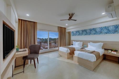 Winter Green Room, 2 Twin Beds at The Fern Habitat, Candolim, Goa - Photo 1