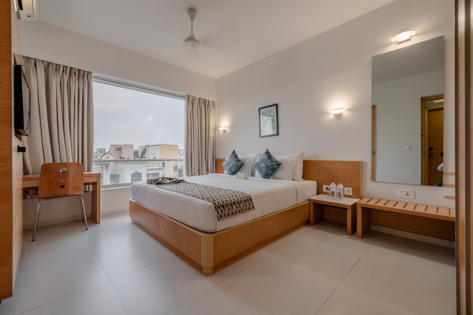 Corporate Business Room (Lounge Sharing Apartment) at Quality Inn Patria Suites, Rajkot - Photo 1