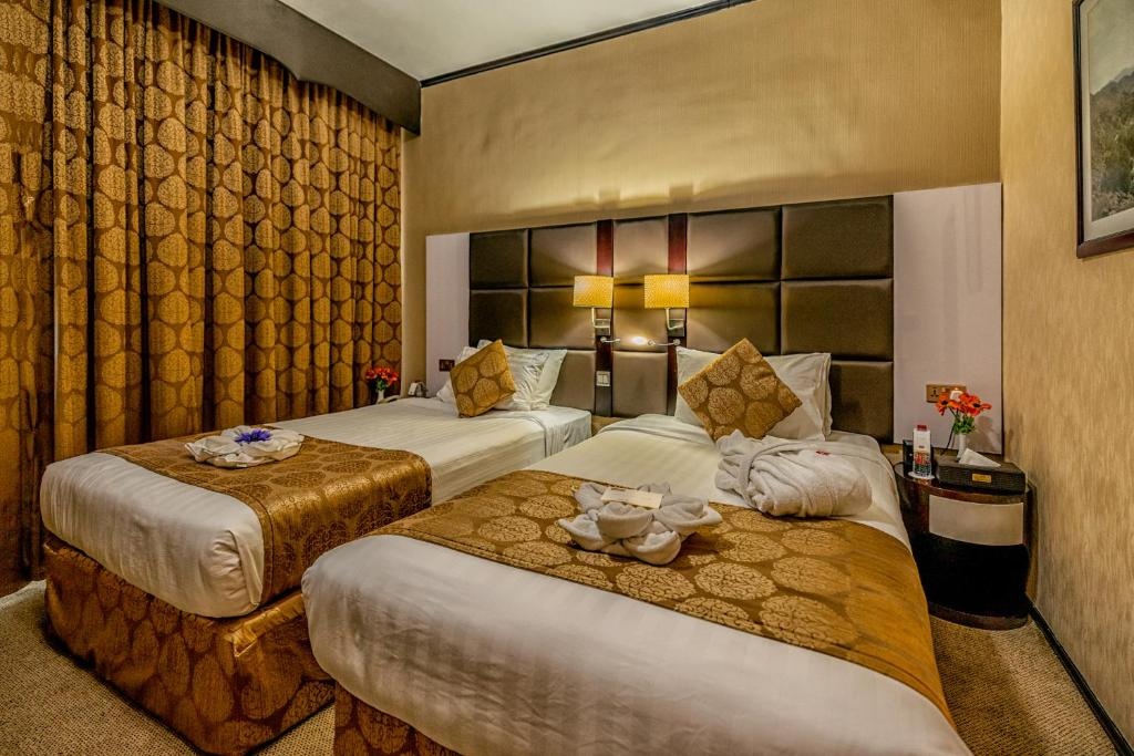 Deluxe Twin Room at THE PARK HOTEL Formerly Al Jawhara Gardens Hotel - Photo 1