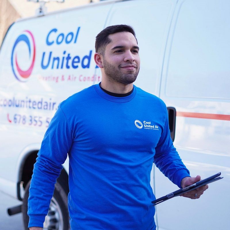 Cool United Air technician arriving residential jobsite