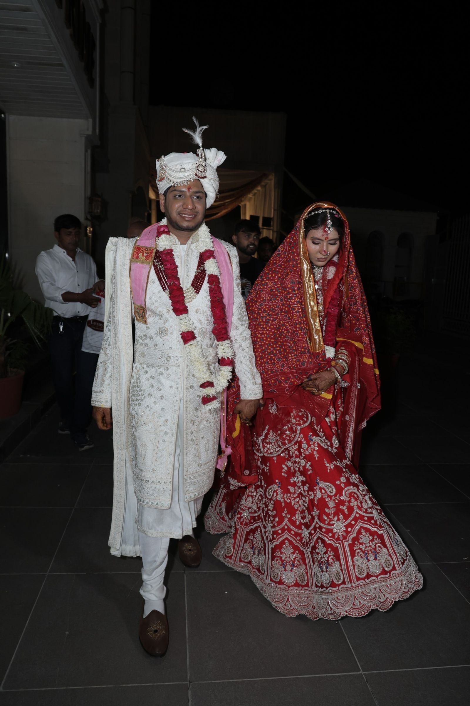 Walking out together after the pheras