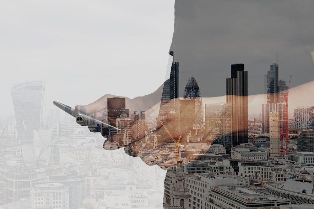 6307-double-exposure-of-success-businessman-using-digital-tablet-with-london-building-and-socia.jpeg