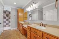 Double Vanity with built in make-up vanity area and extra cabinets!