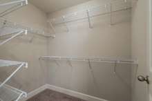 (Photos of Model Home) Massive walk-in closet in Primary Suite!