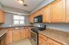 Solid wood cabinetry and newer appliances in this kitchen. Ample storage!