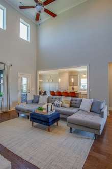 The 2 story ceiling in the family room gives so much natural lighting.