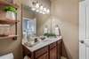 Huge vanity/sink area to get ready to start your day! Ample storage and beautiful, neutral color scheme. 