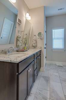 Large Primary bath with double vanities and an extra large shower. 