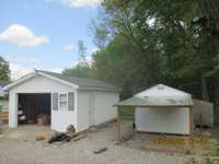 Detached garage & out building. 