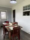 Lovely shiplap wall and updated light fixture