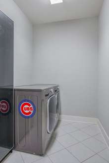 Extra spacious laundry room. It' large enough for a refrigerator or freezer 