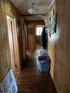 Hallway between bedrooms with large hall closet