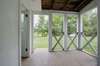 Screened back porch w/ beadboard ceiling