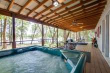 Look at this view and amazing hot tub! Old Hickory lake is calling your name. 12’x47’ porch