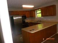 Spacious kitchen, oak cabinetry, stainless steel appliances